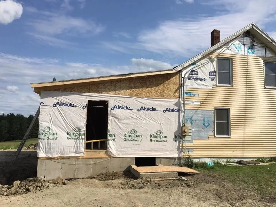 Building extension with insulation materials visible